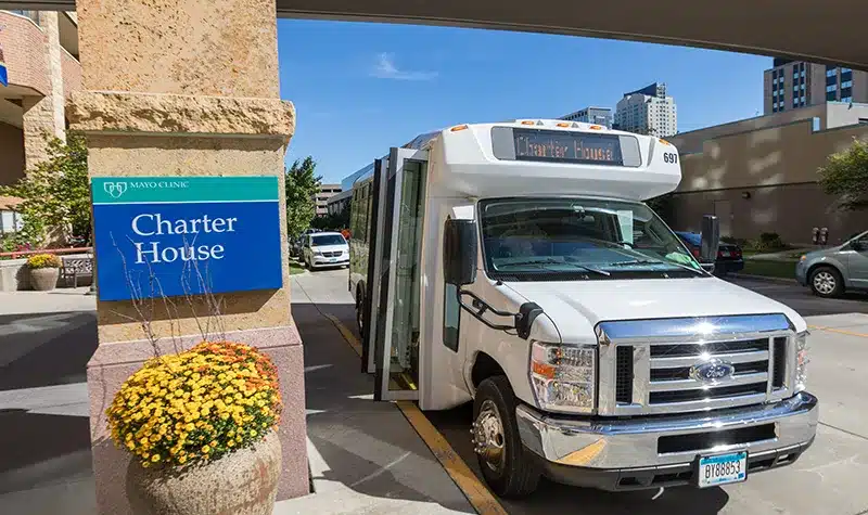 Charter House Shuttle Bus Near Entrance