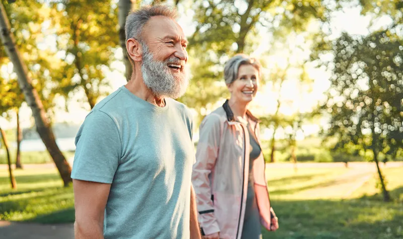 Two Residents Enjoying An Outdoor Walk