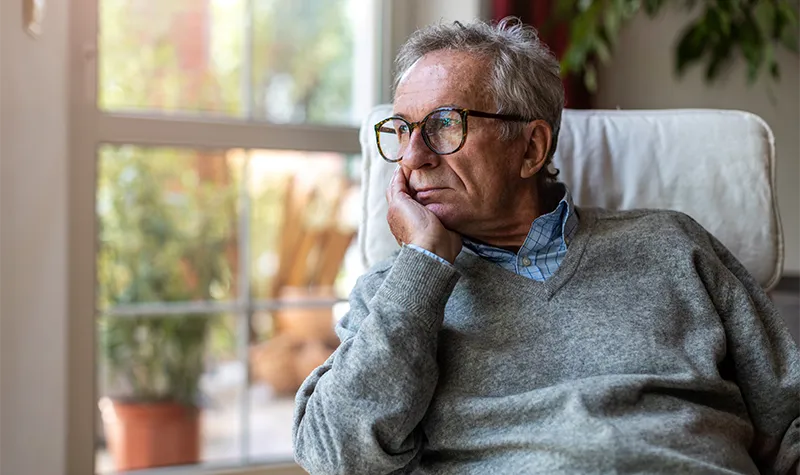 Elderly Male Lonely By Window