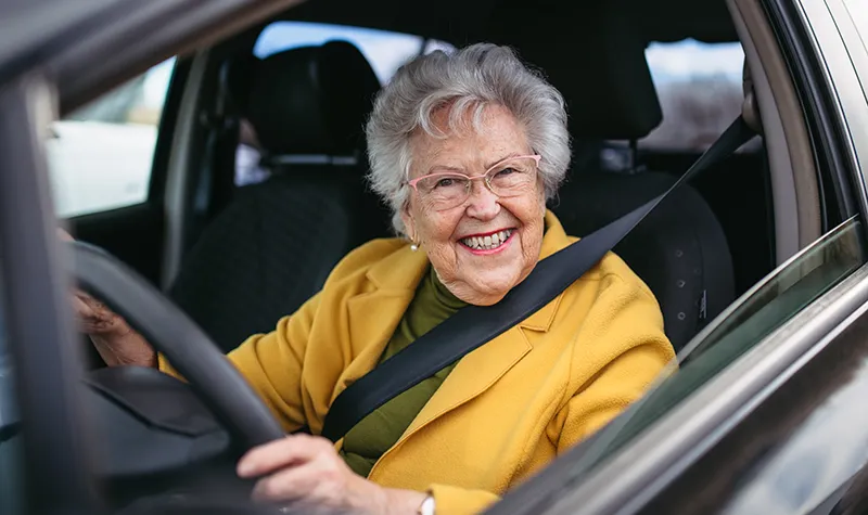 Elderly Lady Driving Car