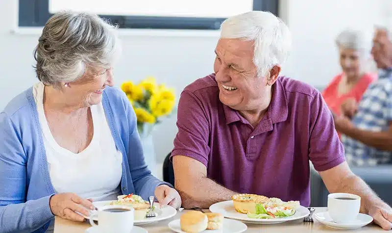 Elderly Couple Having A Meal