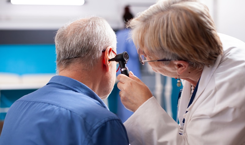 Elderly Resident Getting Ears Checked