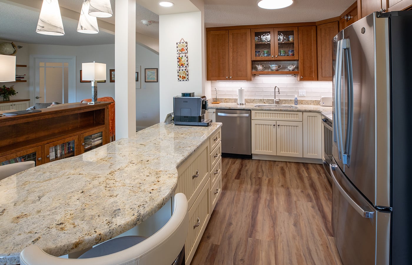 Kitchen With Light Counters And Stainless Appliances